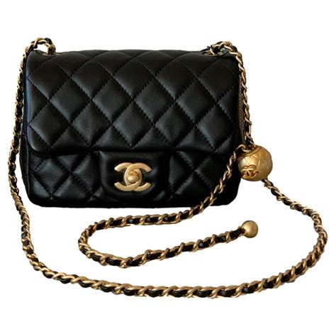 chanel mini bag with pearl strap|chanel mini flap bag price.